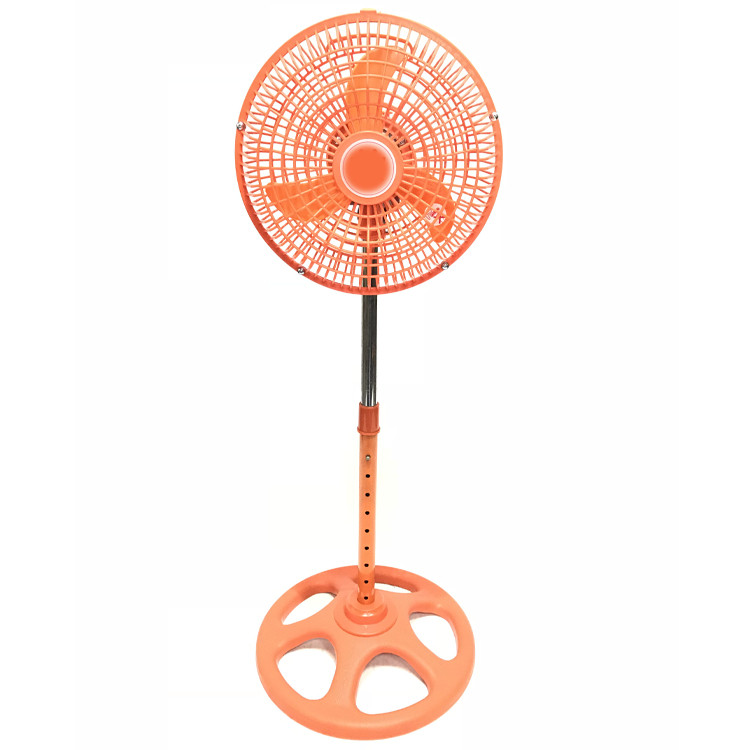 Orange pedestal stand fan
